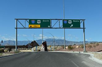 Added 8 photos from 10/23/25 of the north end at SR 157 (Kyle Canyon Road) in Las Vegas. Sign changes replacing shields for I-515 with I-11 in Las Vegas and Henderson were finalized by Fall 2025. Only one remaining I-515 shield was spotted on a recent visit to Las Vegas last month.