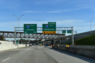 I-75 lowers toward the Ocmulgee River and Interstate 16 east