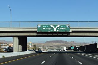 I-15 north a half mile ahead of I-40 east to Needles, CA.