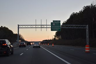 I-40 east 1.5 miles from US 70/Future I-42 east and Toll NC 540 west.