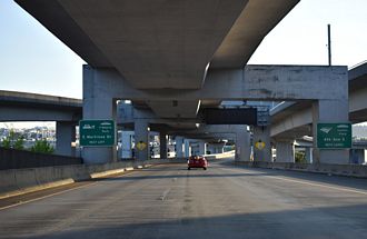 I-90 spans 6th Ave S ahead of the ramps for SR 519 and 4th Ave S