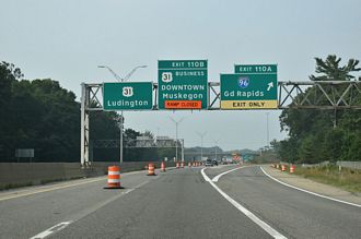 Updated photos covering the west end of Interstate 96 at Norton Shores, Michigan from July 18, 2026. Surprisingly the signage along both directions of U.S. 31 leading to the cloverleaf interchange with I-96 and U.S. 31 Business was unchanged from the 2009 photos previously posted.