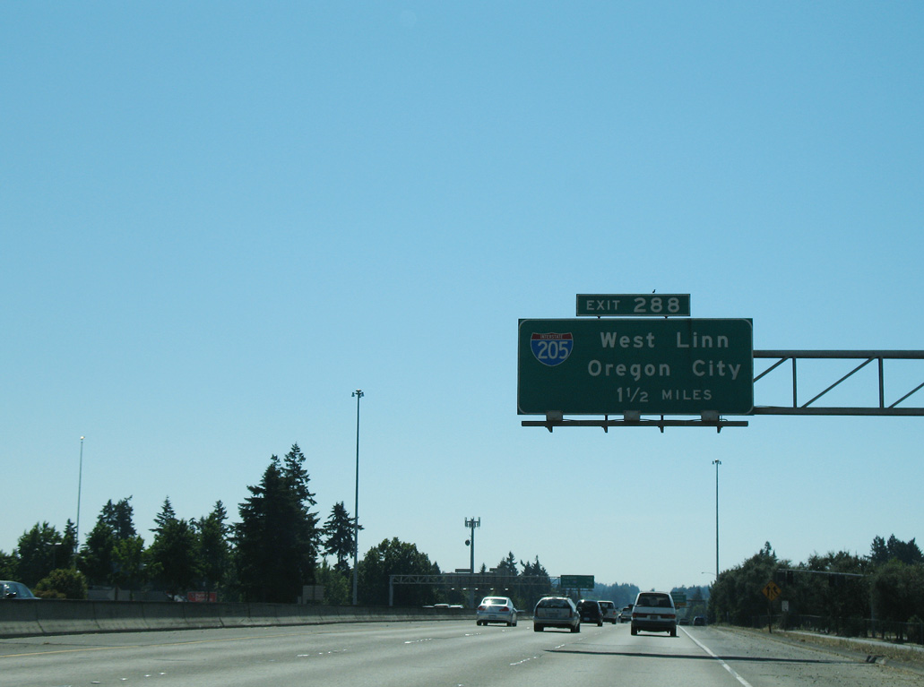 Removed overhead for I-205 that was posted 1.5 miles ahead of Exit 288