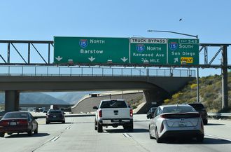 I-215 north at Exit 54 B to I-15 south at Devore in San Bernardino, CA.
