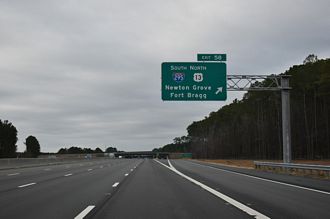 The final section of the Fayetteville Outer Loop opened to traffic on November 25, 2025. Added/replaced 7 photos at the north end from 07/11/25 and 07/29/25. Also added five photos of the south end from 07/11/24.