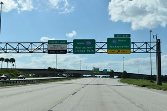 Exit 61 B departs I-295/East Beltway south for I-95 north.