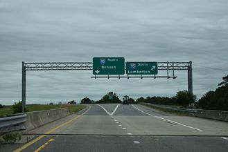 Ramps split from the north end of I-295 for I-95