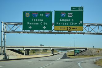 The Kansas Turnpike continues northeast from I-35 at Emporia along Interstate 335 