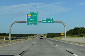 IH 40/US 270 east at Peebly Rd, one mile from the Kickapoo Turnpike north