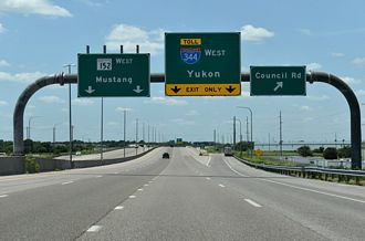 Interstate 344 was approved by AASHTO for the John Kilpatrick Turnpike around Oklahoma City in 2023. Signage finally went up in 2025. Posted photos from July 11, 2026 covering both ends from every direction.