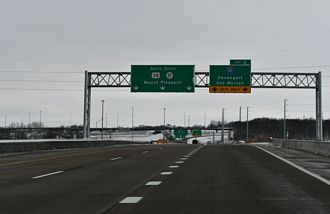 Two lanes separate from I-380/U.S. 218 south for I-80 at Tiffin, Iowa