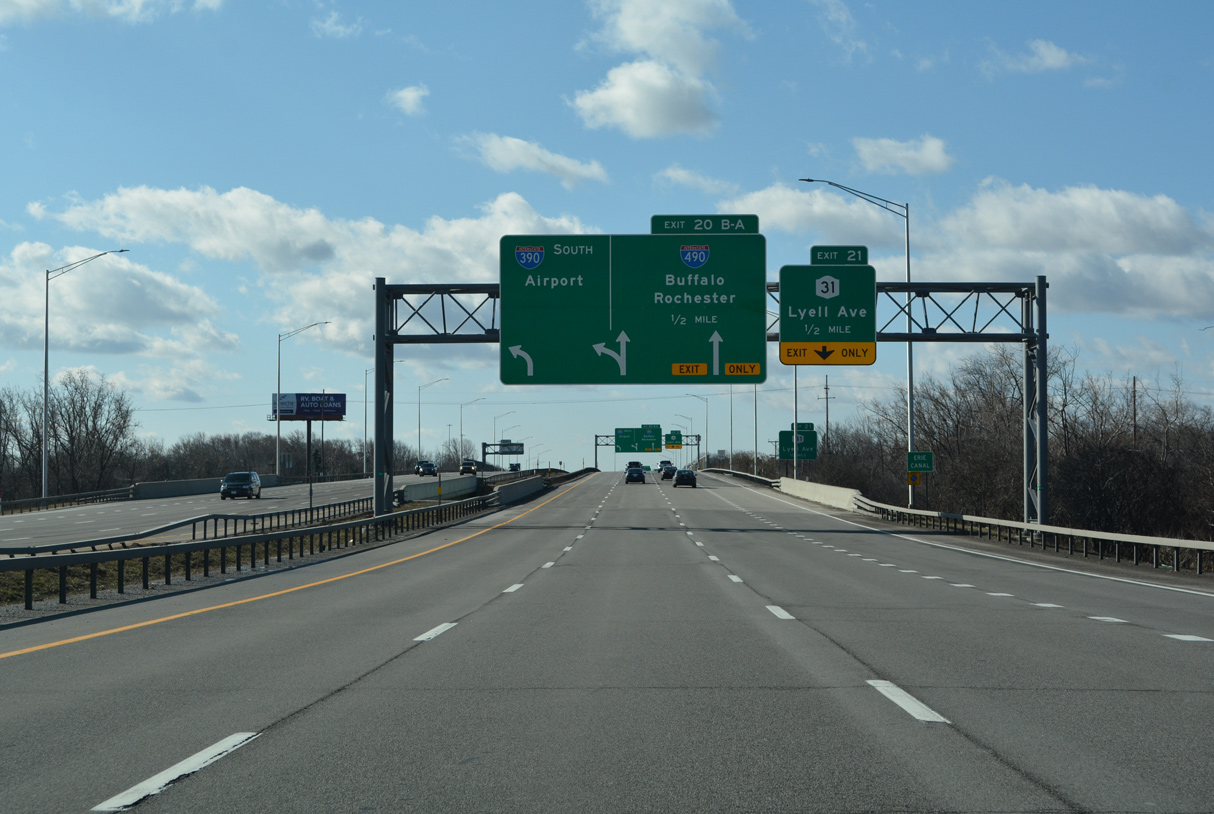 NY 390 south crosses the Erie Canal a half mile ahead of I-390/490.