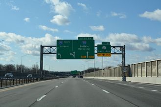 NY 390 south meets NY 31 ahead of I-390/490.