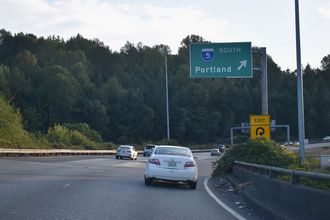 I-405 south ends at the ramp for I-5 south. SR 518 extends 3.40 miles west