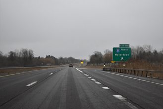NY 481 south at I-81 north to Watertown.