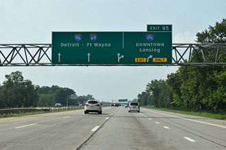Added photos covering both ends of Interstate 496 in Michigan from July 19, 2026 and map scans of Lansing from 1965 and 1970.