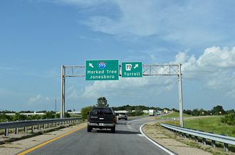 Exit 23 separates for I-555/AR 77 north and US 61/AR 77 south