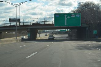 Two lanes separate from I-490 east beyond Winton Rd for I-590/NY 590.