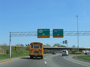 Ramps for NY 590 (Seabreeze Exprwy) north and I-590 (Rochester Outer Lp) south separate from I-490 east.