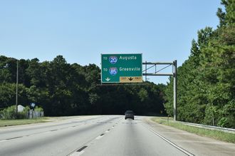 Former sign referencing I-20 and I-85 at the north end of I-675