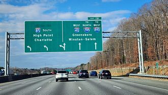 I-40/85 split in a half mile at I-785/840 in Greensboro, NC.
