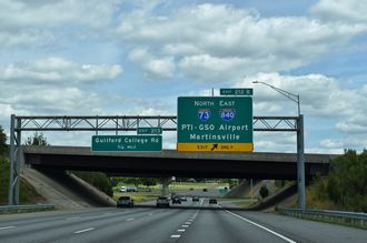 I-40 east at I-73/840 north to PTI Airport and Martinsville, VA.