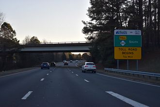I-885 south at E Conwallis Road, 0.75 miles from NC 885 (TriEx).