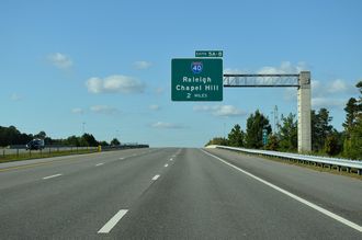 NC 885 (TriEx) north crosses Davis Dr two miles south of I-40/885.