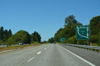 Routes to Canada diagrammatic sign posted on I-5 north at Blaine, WA