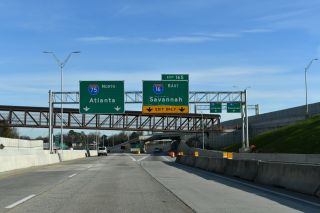 I-75 lowers toward the Ocmulgee River and Interstate 16 east
