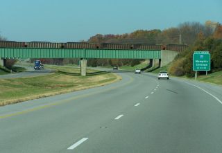 Replaced guide sign posted two miles ahead of I-57 on I-24 westbound