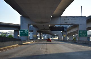 I-90 spans 6th Ave S ahead of the ramps for SR 519 and 4th Ave S