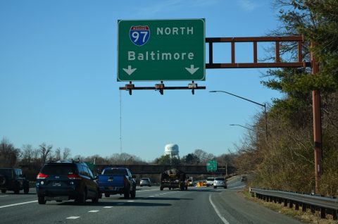 I-97 begins north from I-595/US 50-301 west at Exit 21.