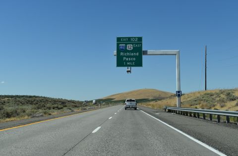One mile south of the exchange with I-182/US 12 east on I-82 westbound