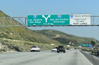 I-15 south 1.25 miles ahead of I-215 and the truck bypass lane at Devore.