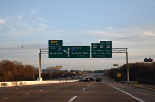 I-40 east converges with I-240 and U.S. 64/70/79 at succeeding exits.