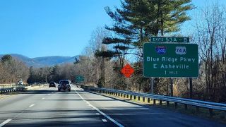 I-40 converges with the east end of I-240 at US 74A at Oakley in Asheville, NC.