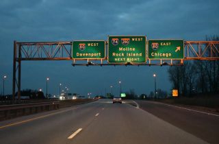 I-74 west at I-80 east to Chicago. The unnumbered exit for I-280 west is next.