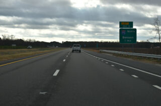 One mile ahead of Left Exit 1 for I-95 north on I-295 south
