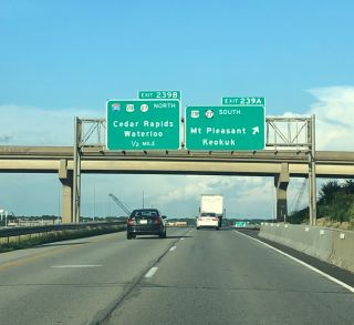 I-80 east at former Exit 239 A for U.S. 218/Iowa 27 south to Iowa City