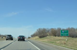 Removed guide sign for I-80 east on U.S. 218/Iowa 27 north.