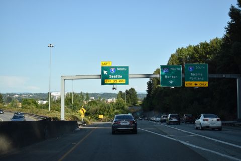 A left exit connects SR 518 east with I-5 north into Seattle. A lane drop occurs at the ramp for I-5 south to Tacoma while a single lane transitions onto Interstate 405 north to Renton. 07/20/23