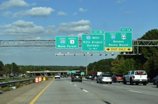 U.S. 64 parts ways with U.S. 1 north for I-40 east as Interstate 440 begins