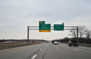 I-74 continues west into Peoria while I-474 passes to the south through Bartonville, IL