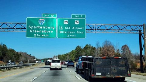 I-485 north two miles ahead of U.S. 29/74 along the west side of CLT Airport
