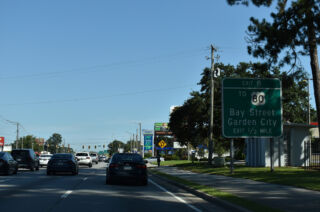 The first exit for I-516 east departs in a half mile.