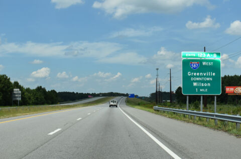 One mile south of I-587 west and SR 1467 east on NC 11 Bypass north