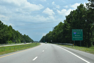 0.75 miles north of I-587 / SR 1467 on US 264/NC 11 Bypass south