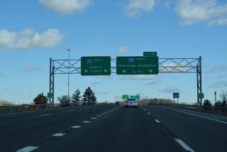 I-390 crosses Erie Canal ahead of Exit 15 for I-590 north in Brighton, NY.
