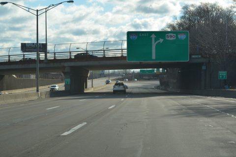 Two lanes separate from I-490 east beyond Winton Rd for I-590/NY 590.